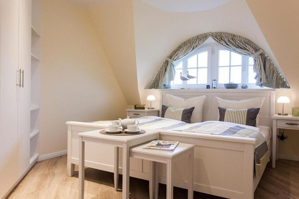 Postel nebo postele na pokoji v ubytování Ferienhaus Haubenlerche 52