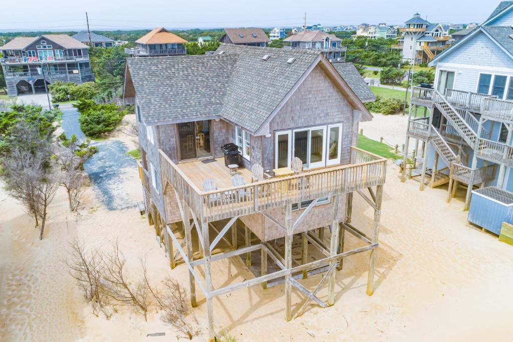 an aerial view of a house on the beach at Windy Dunes 138 in Avon