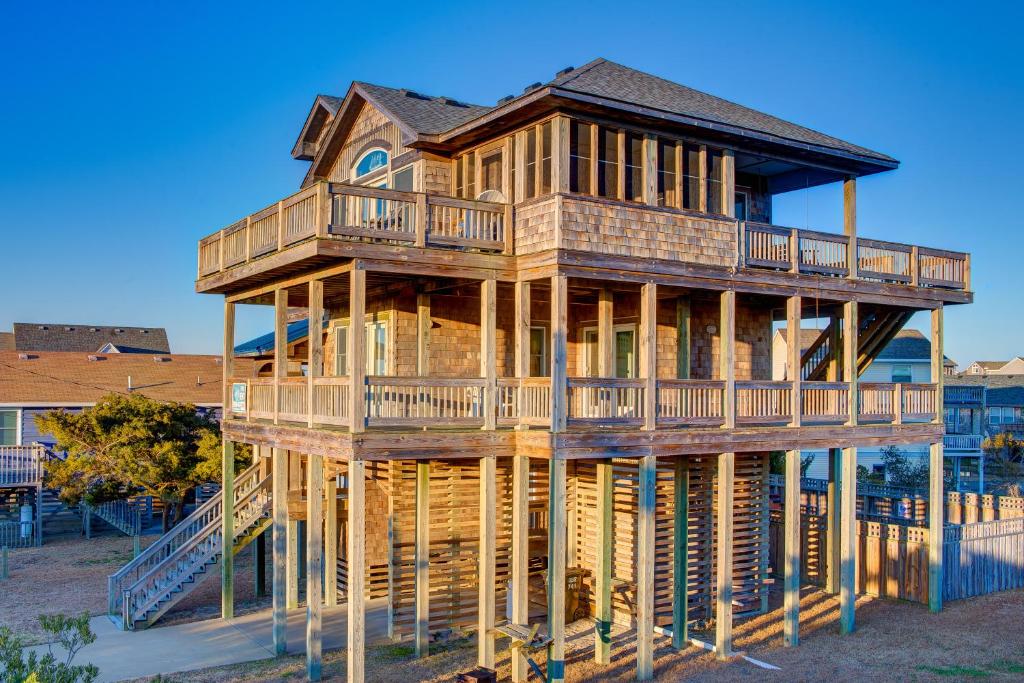 a large wooden house on stilts at Passing Winds 741 in Salvo