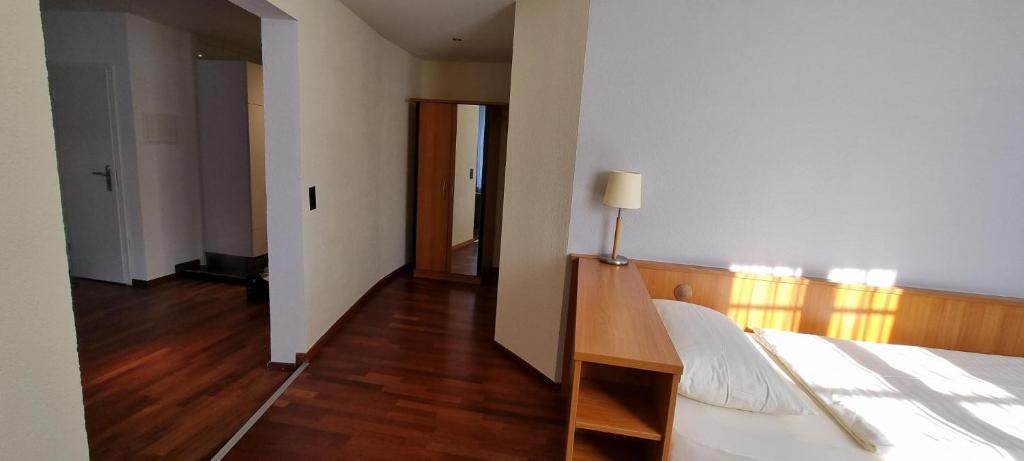 Postel nebo postele na pokoji v ubytování Apart Hotel Amadeo