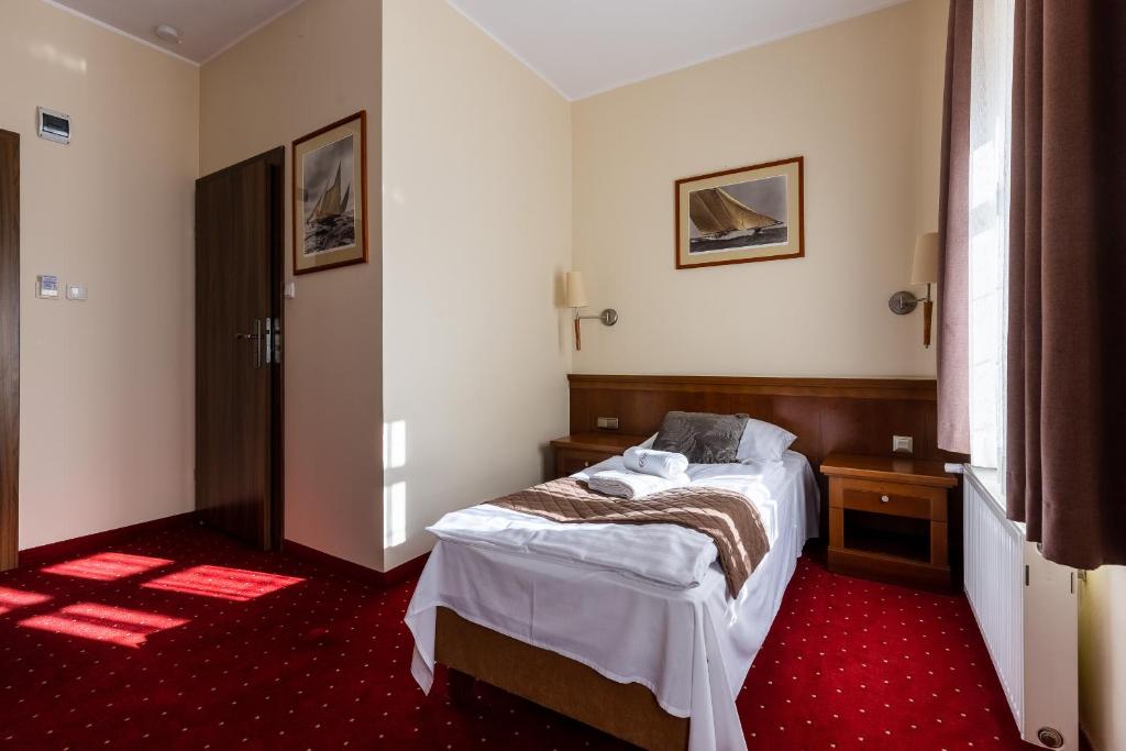 Posteľ alebo postele v izbe v ubytovaní Hotel Diamond w Białym Dworku