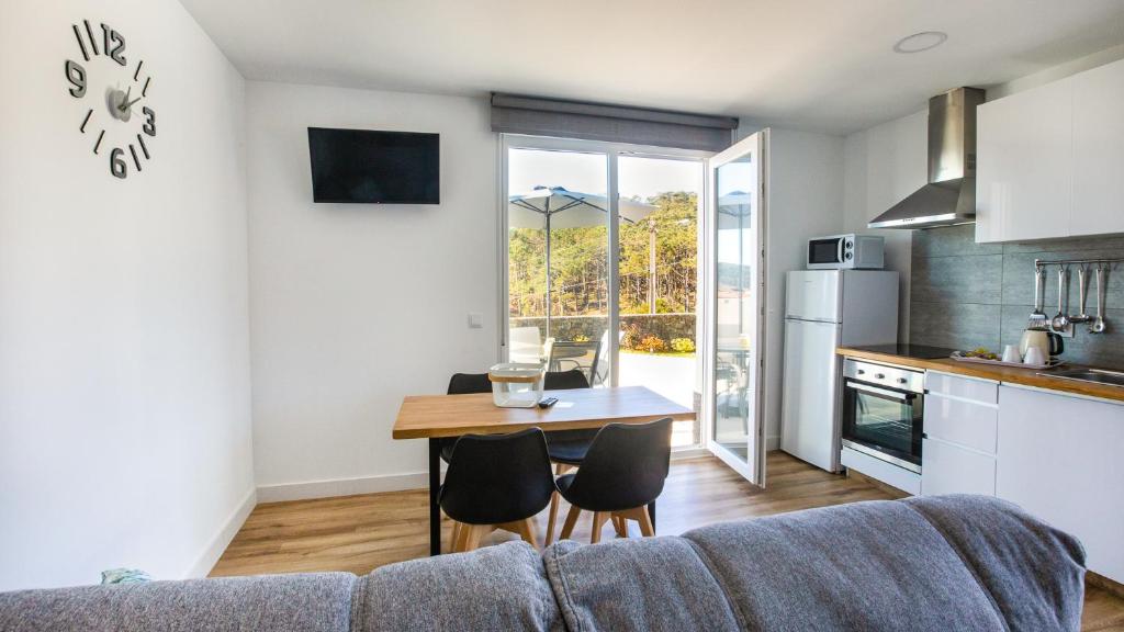 Kuchyň nebo kuchyňský kout v ubytování Hospedium Apartamentos Galitrips A Casa Da Reina