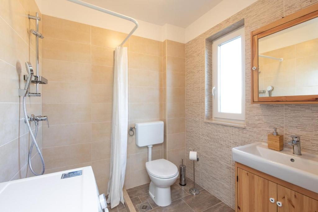 Koupelna v ubytování Apartments Brig perfect countryside holiday!