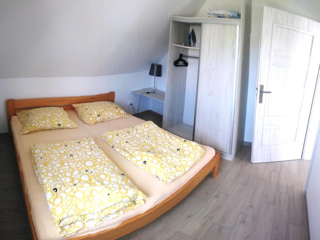 Posteľ alebo postele v izbe v ubytovaní Jaskółka 2