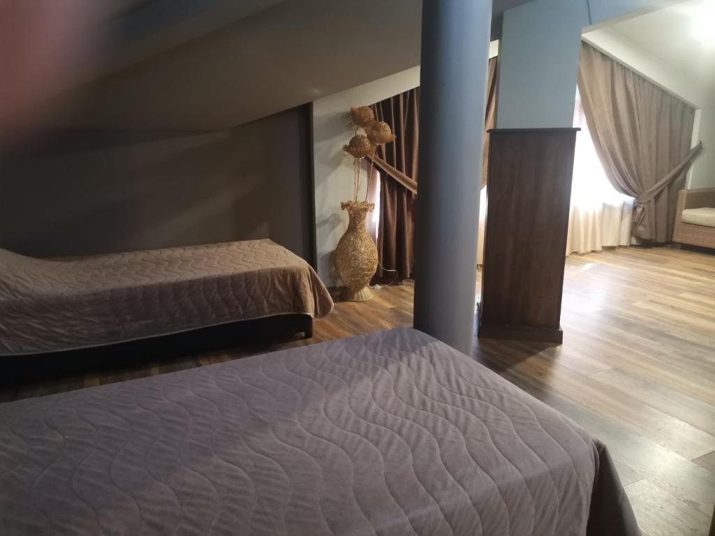Postel nebo postele na pokoji v ubytování Vival Hotel