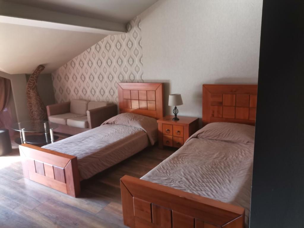 Postel nebo postele na pokoji v ubytování Vival Hotel