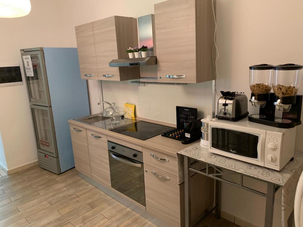 Kuchyň nebo kuchyňský kout v ubytování B&B A Casa Di Joy