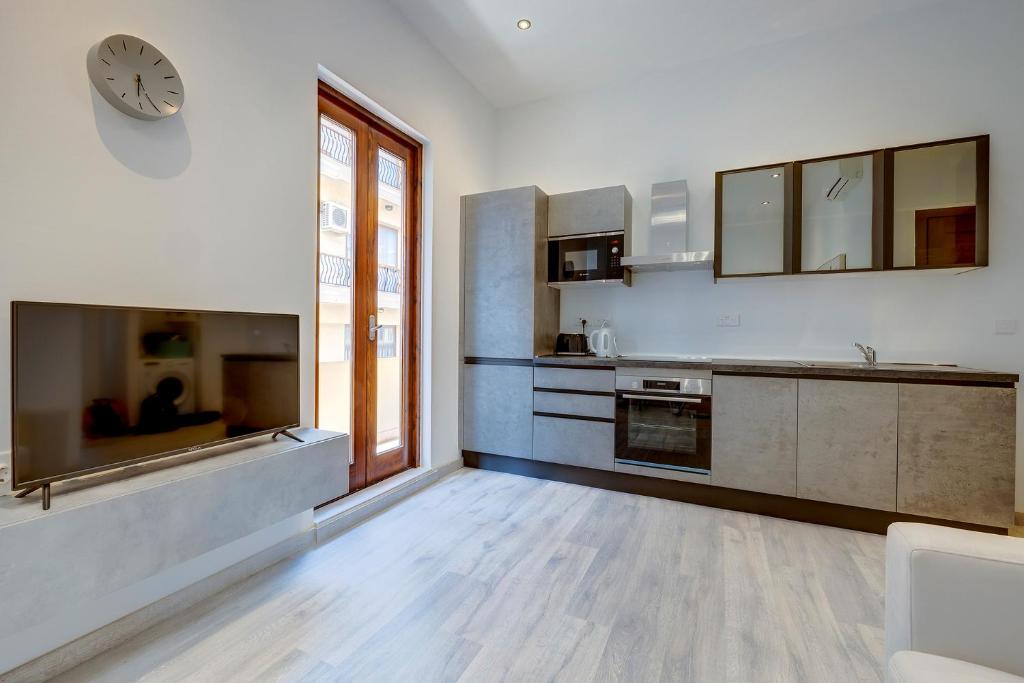 Kuhinja oz. manjša kuhinja v nastanitvi Modern Apartment in the Best Area of Sliema