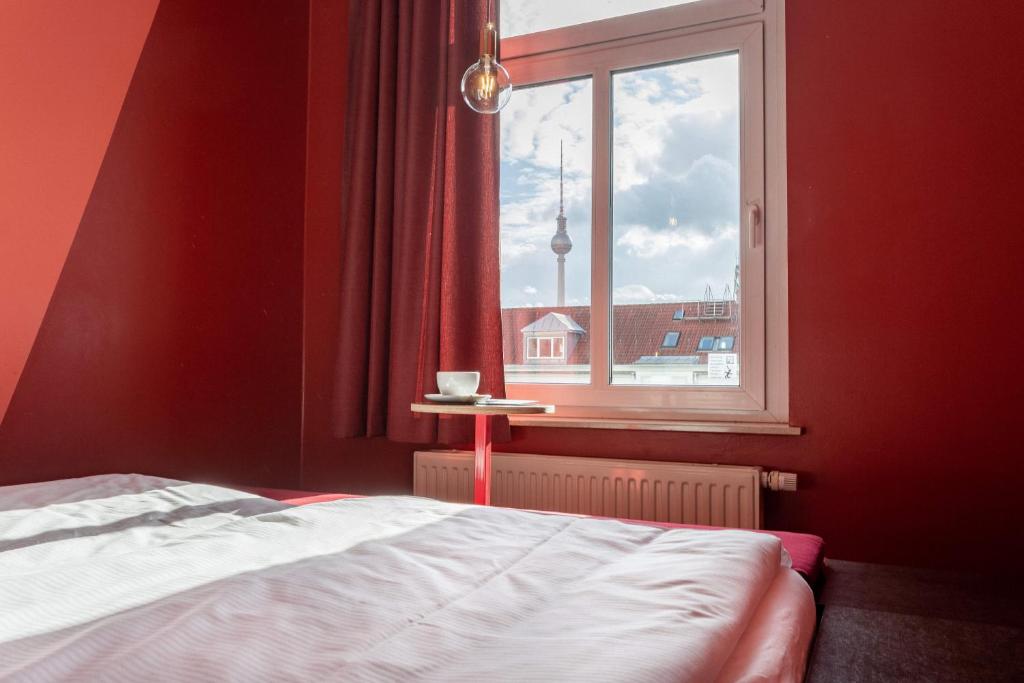 Postel nebo postele na pokoji v ubytování The Circus Hostel