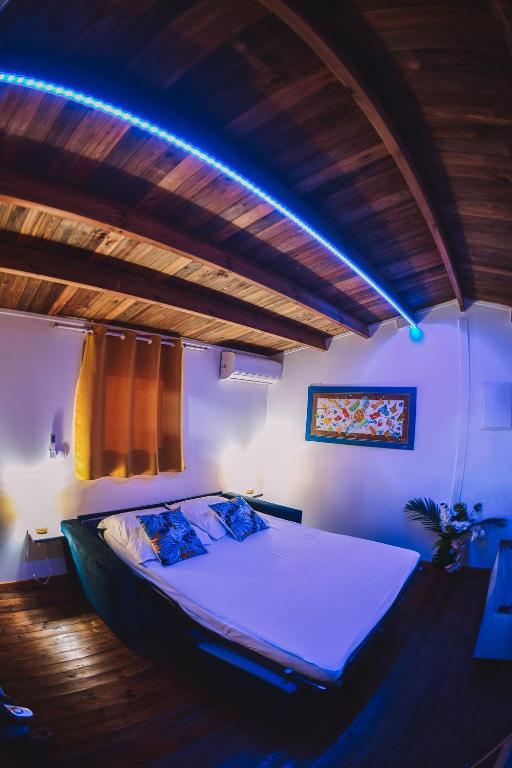 Postel nebo postele na pokoji v ubytování Bungalow de Nola