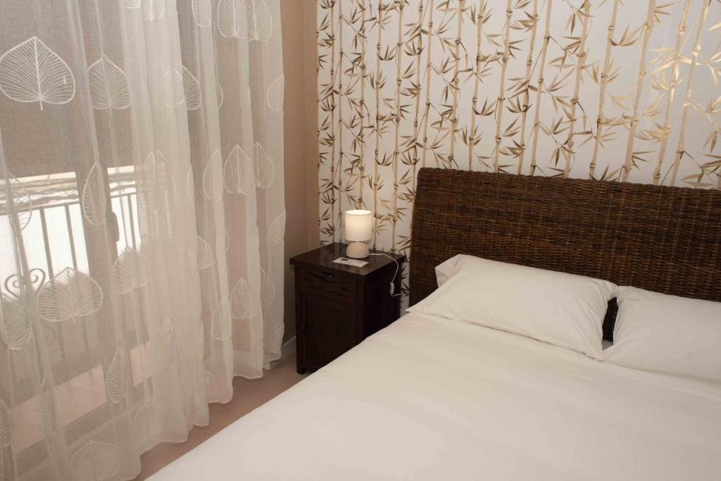 Postel nebo postele na pokoji v ubytování Hotel Almunia