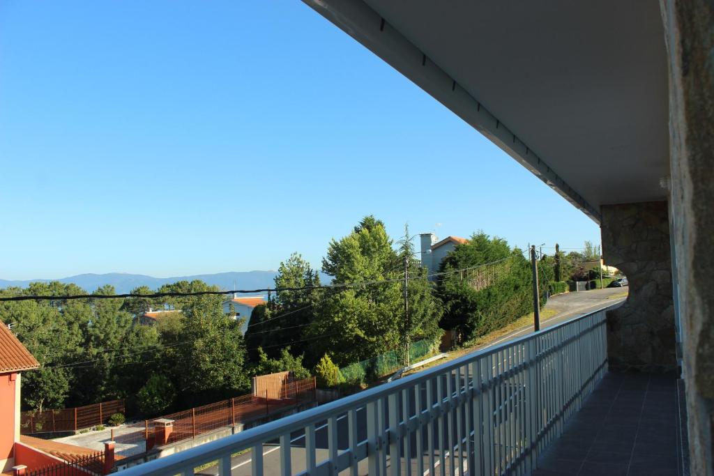Balkón alebo terasa v ubytovaní Bonita vivenda con jardín en playa Aguieira