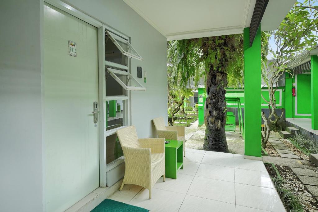 TV a/nebo společenská místnost v ubytování Negara Hotel - CHSE Certified