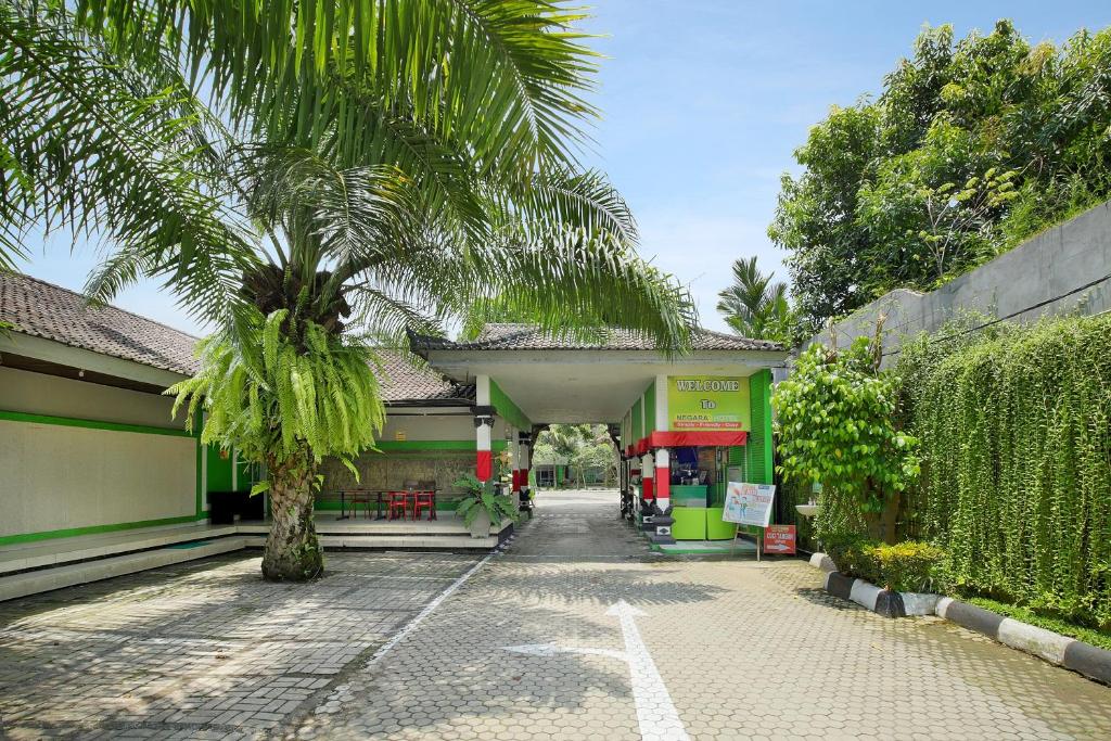 Zahrada ubytování Negara Hotel - CHSE Certified