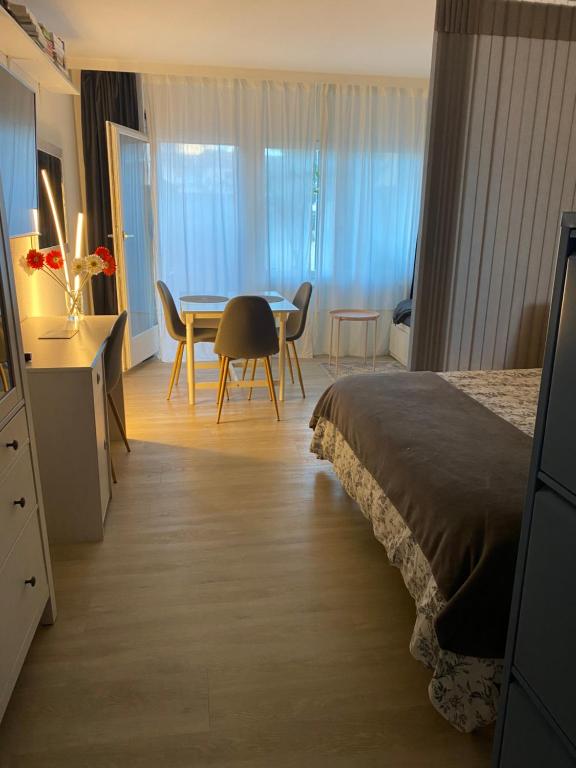 Postel nebo postele na pokoji v ubytování Studio 4pers aux Bains de Saillon