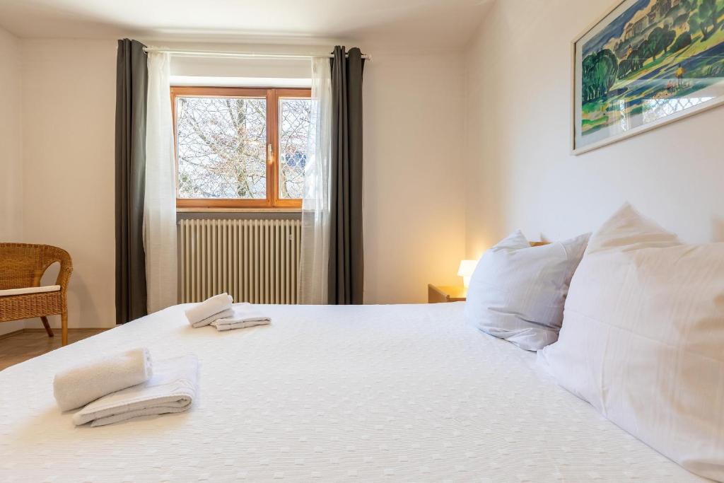 Postel nebo postele na pokoji v ubytování Serviced Appartement München Messe