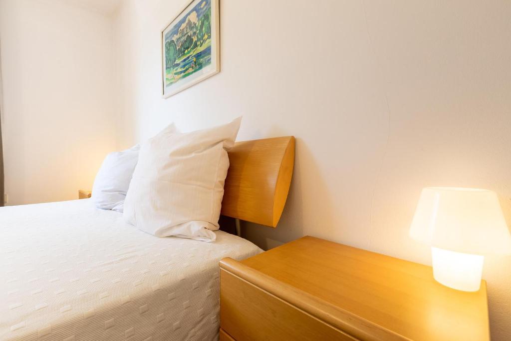 Postel nebo postele na pokoji v ubytování Serviced Appartement München Messe