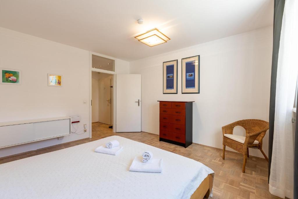 Postel nebo postele na pokoji v ubytování Serviced Appartement München Messe