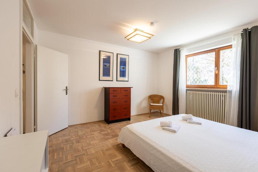 Postel nebo postele na pokoji v ubytování Serviced Appartement München Messe