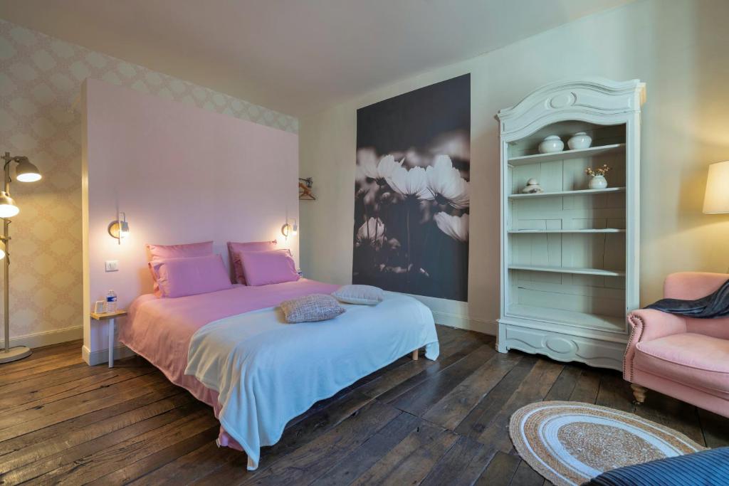Postel nebo postele na pokoji v ubytování Chambre d'hôtes Conquans