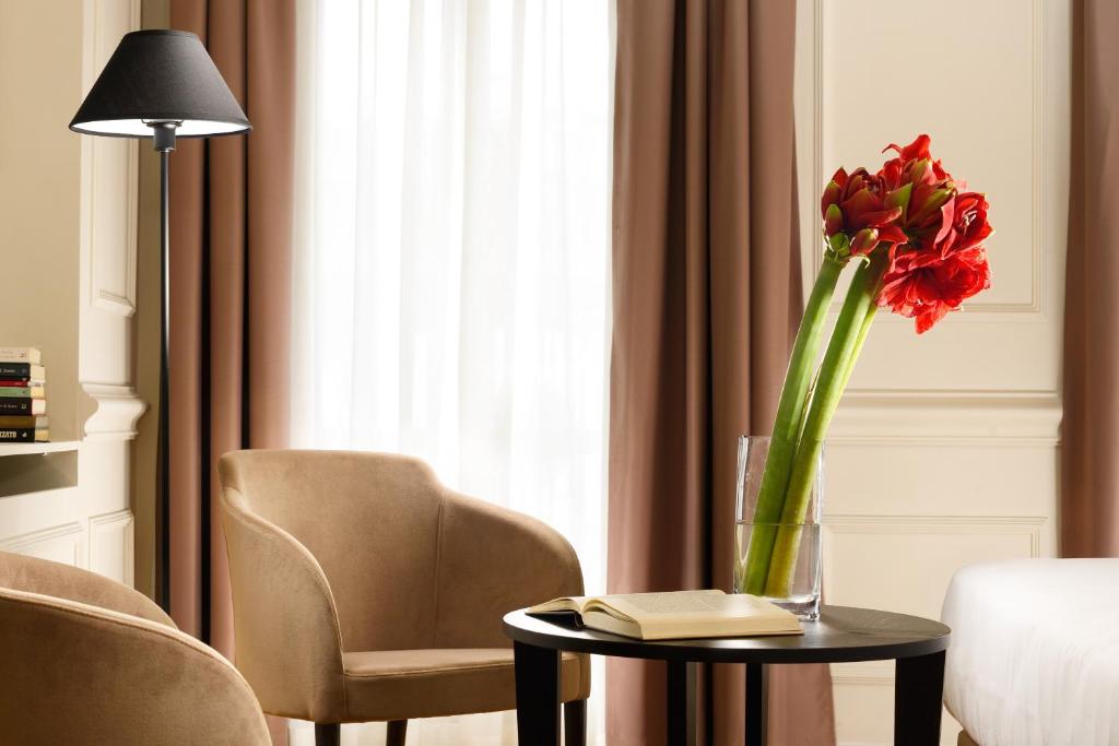 A seating area at Splendor Suite Rome - Suites & Apartments