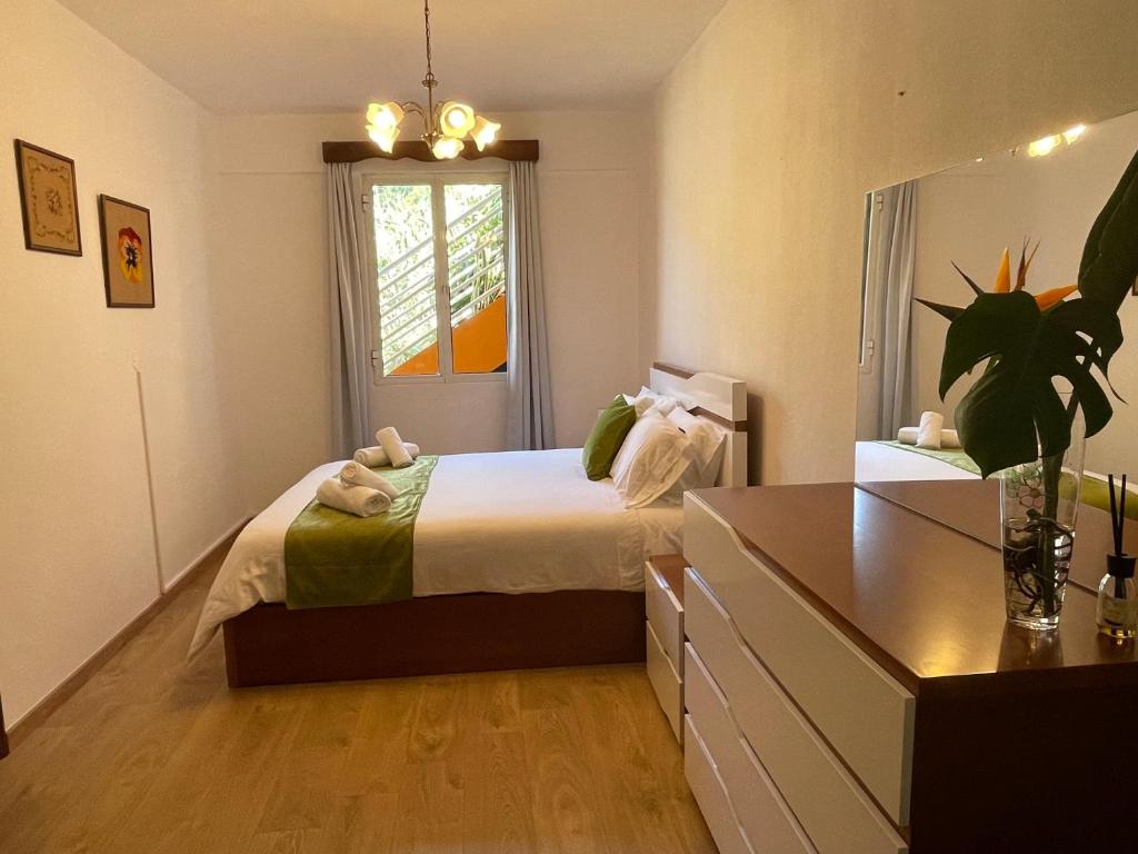 Postel nebo postele na pokoji v ubytování Sunset House