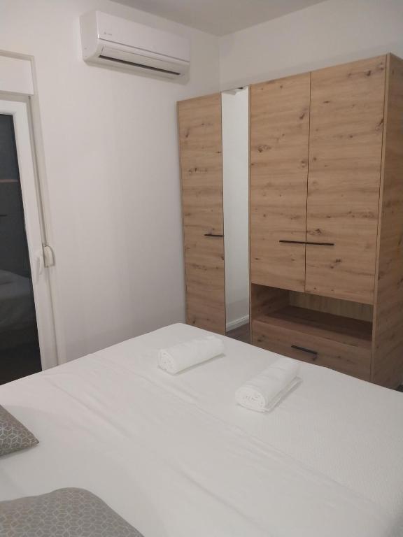 Posteľ alebo postele v izbe v ubytovaní Apartman R&B Zadar
