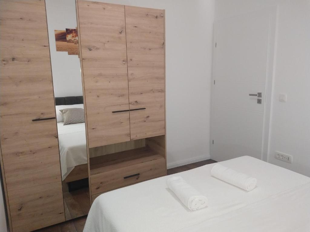 Posteľ alebo postele v izbe v ubytovaní Apartman R&B Zadar