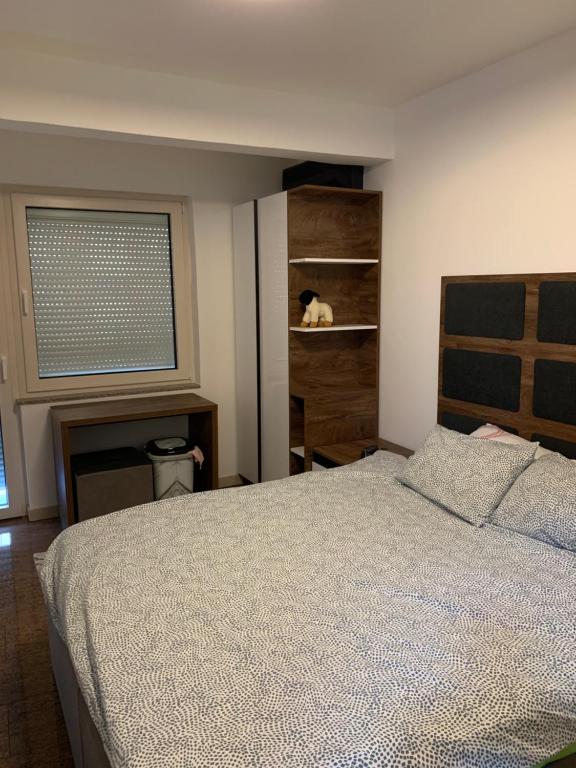 Postel nebo postele na pokoji v ubytování Aleksinac