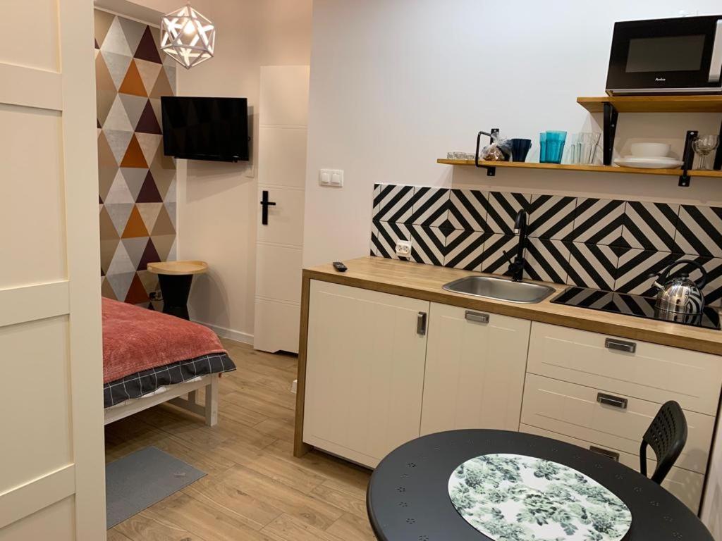 Kuchyňa alebo kuchynka v ubytovaní APARTAMENT WILEŃSKA #free parking, self check-in