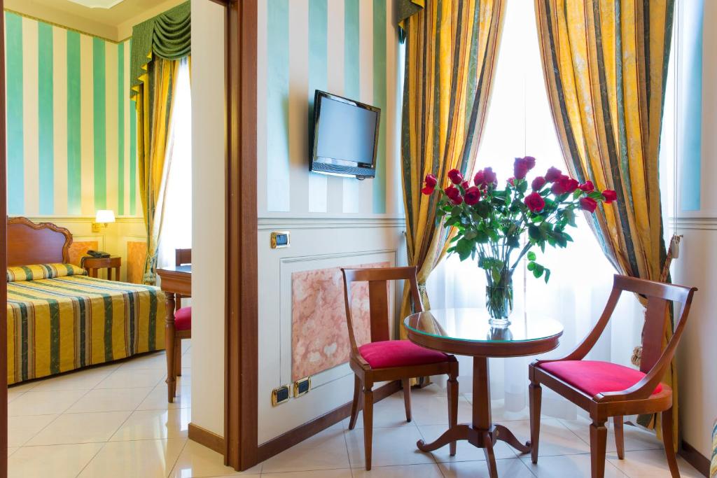 TV a/nebo společenská místnost v ubytování Hotel Londra