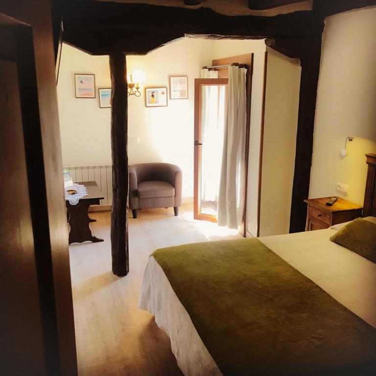 Cama o camas de una habitación en Posada Las Espedillas