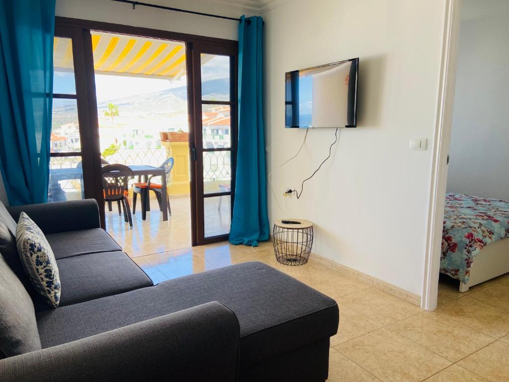 Televízia a/alebo spoločenská miestnosť v ubytovaní Ocean view apartamento Windsor park