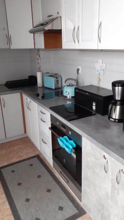 Kuchyňa alebo kuchynka v ubytovaní Apartament na nowej starówce
