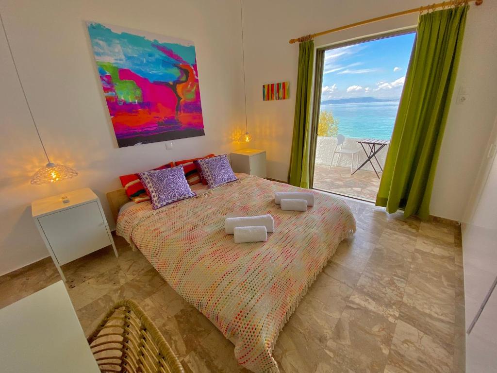 Postel nebo postele na pokoji v ubytování The Beachhouse Apartments