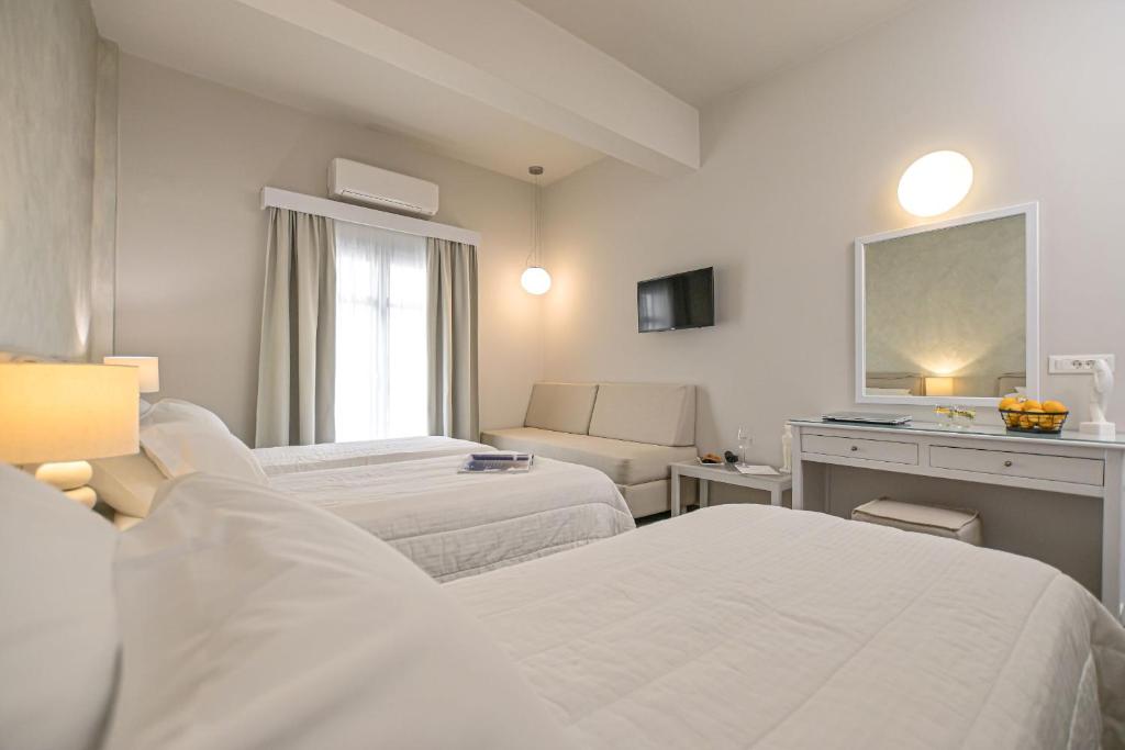 Voodi või voodid majutusasutuse Hotel Grotta toas