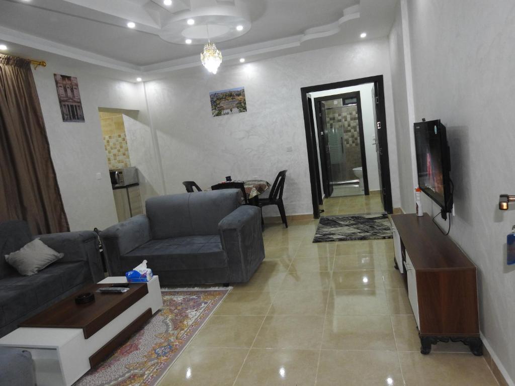 TV a/nebo společenská místnost v ubytování Amro Petra Apartment