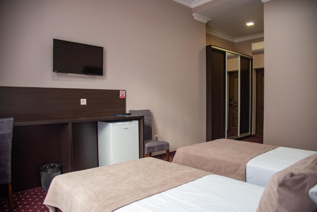 Postel nebo postele na pokoji v ubytování T&S Apart-Hotel