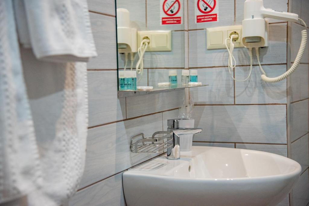 Koupelna v ubytování T&S Apart-Hotel