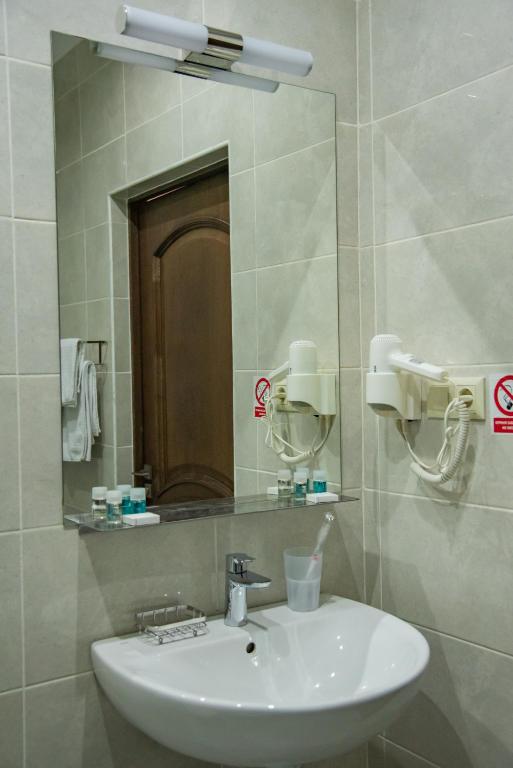 Koupelna v ubytování T&S Apart-Hotel