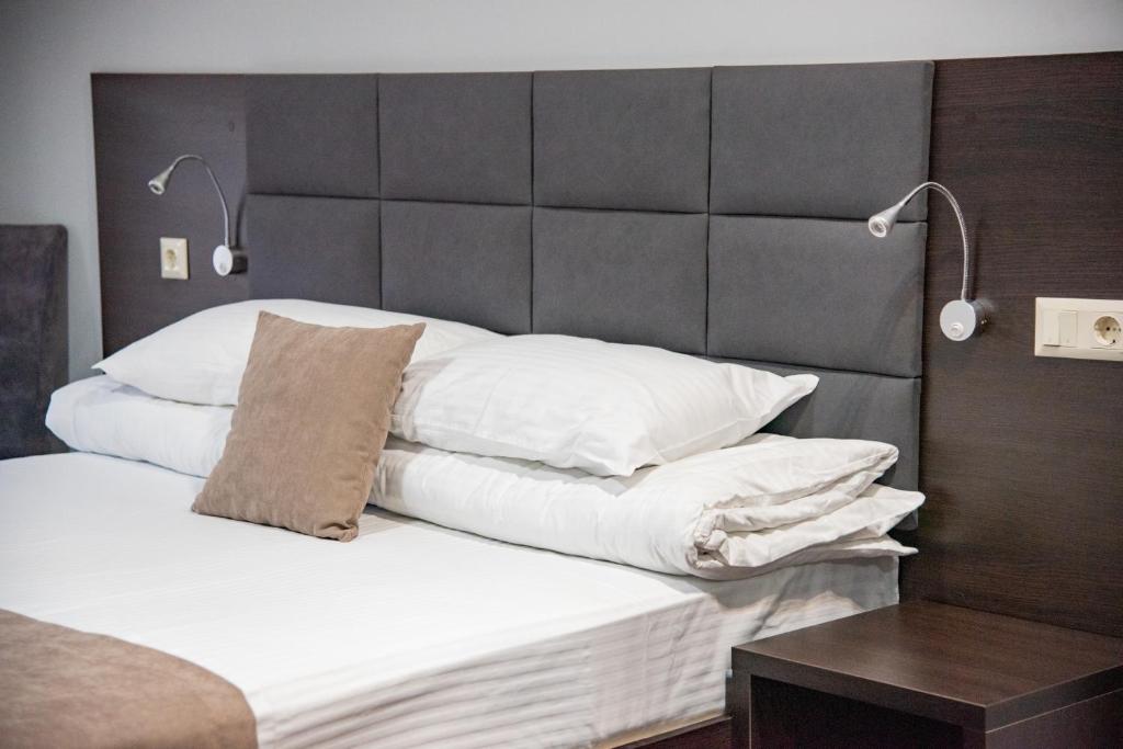 Postel nebo postele na pokoji v ubytování T&S Apart-Hotel
