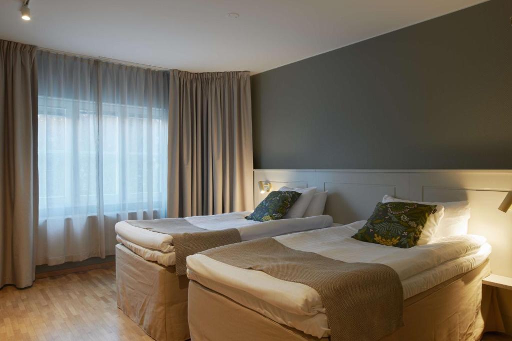 Postel nebo postele na pokoji v ubytování Best Western Hotel Danderyd