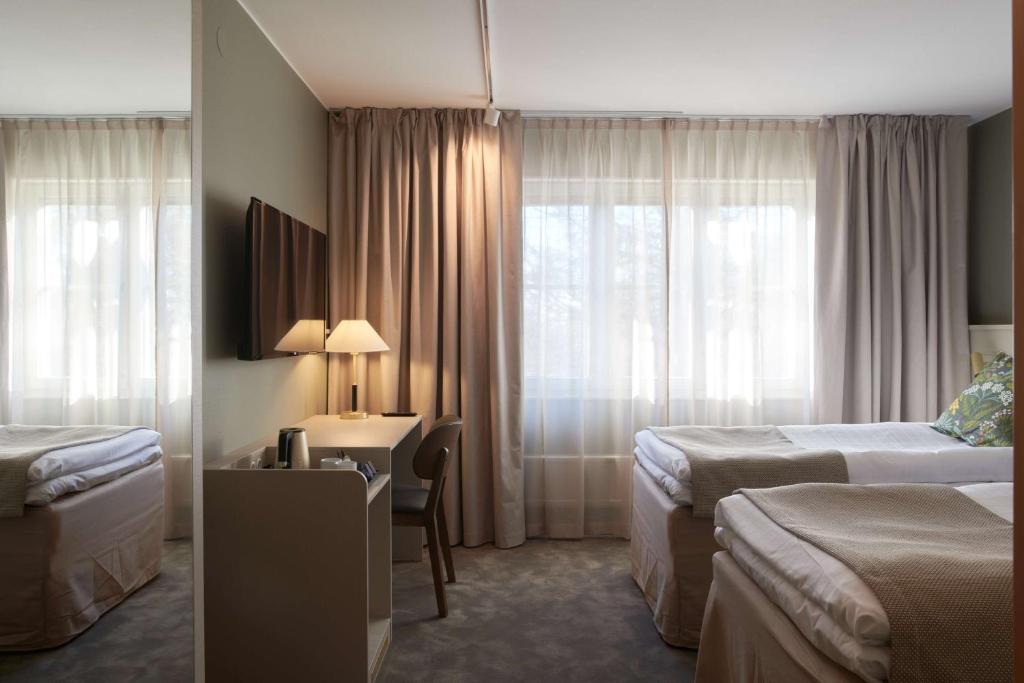 Postel nebo postele na pokoji v ubytování Best Western Hotel Danderyd