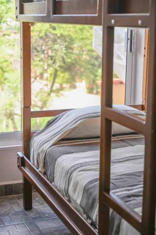 Postel nebo postele na pokoji v ubytování Casa LEONOR
