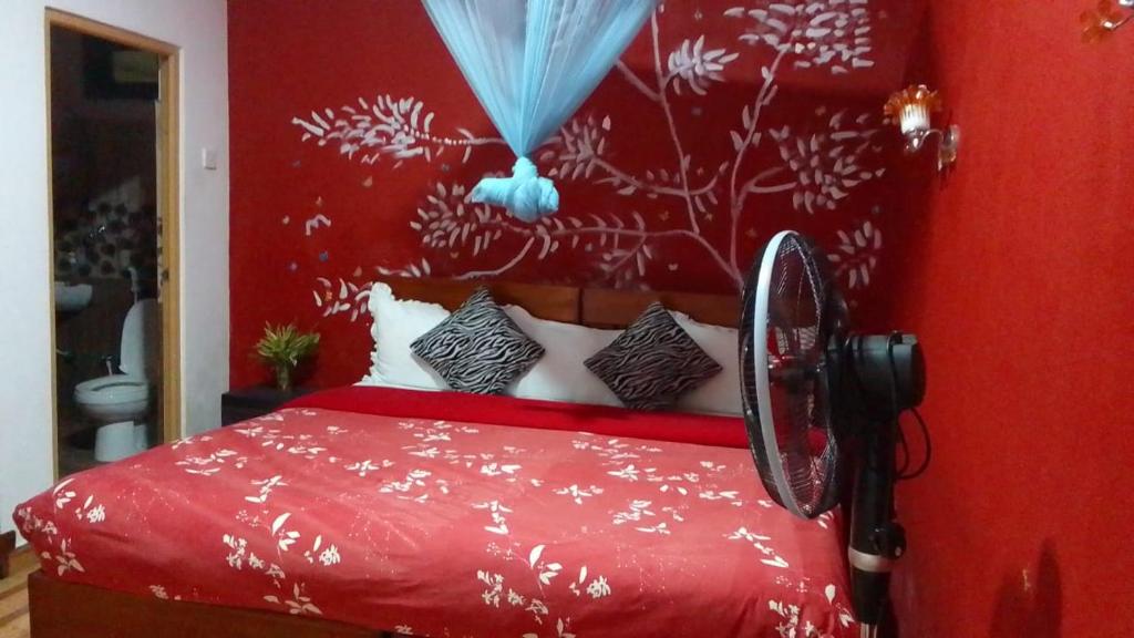 Postel nebo postele na pokoji v ubytování Secret Nest Homestay