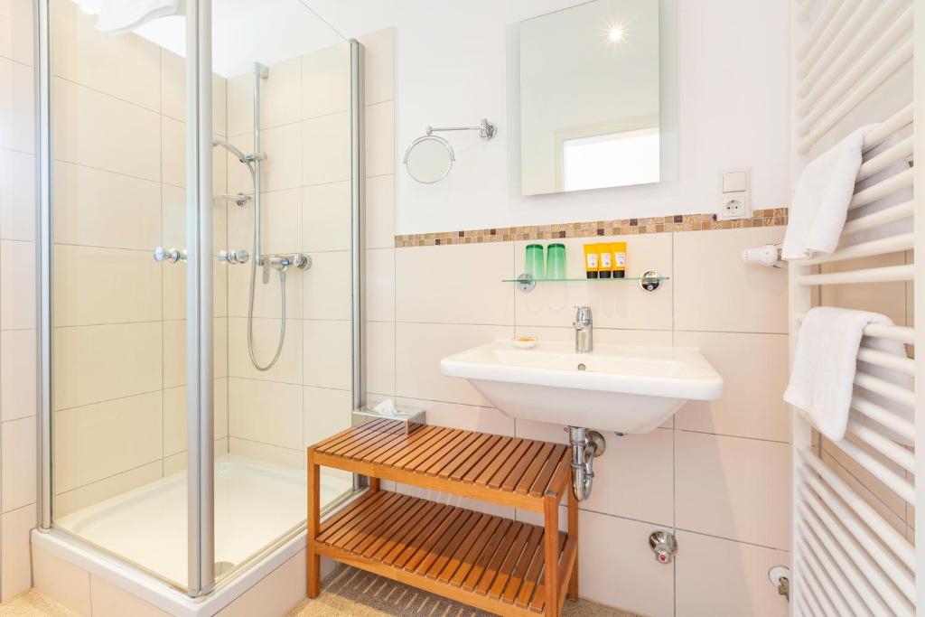 Koupelna v ubytování Hotel Berlin Tegernsee