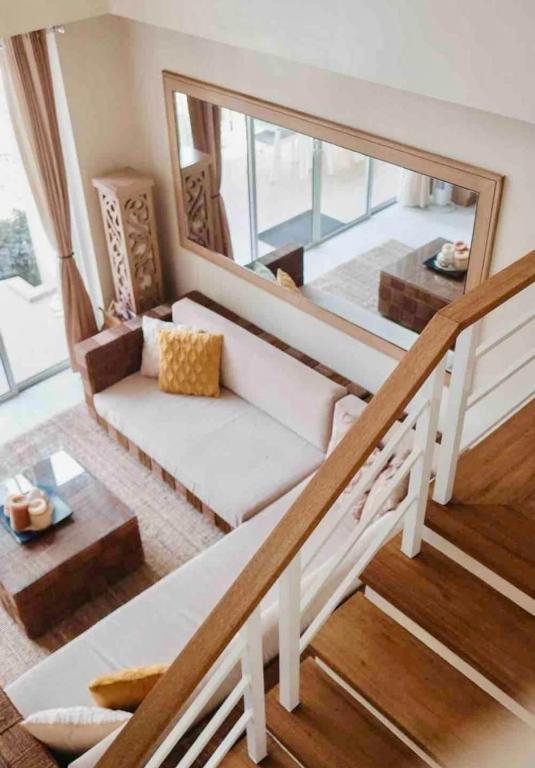 Postel nebo postele na pokoji v ubytování Pico de Loro 2 BD Garden Loft with Lagoon View