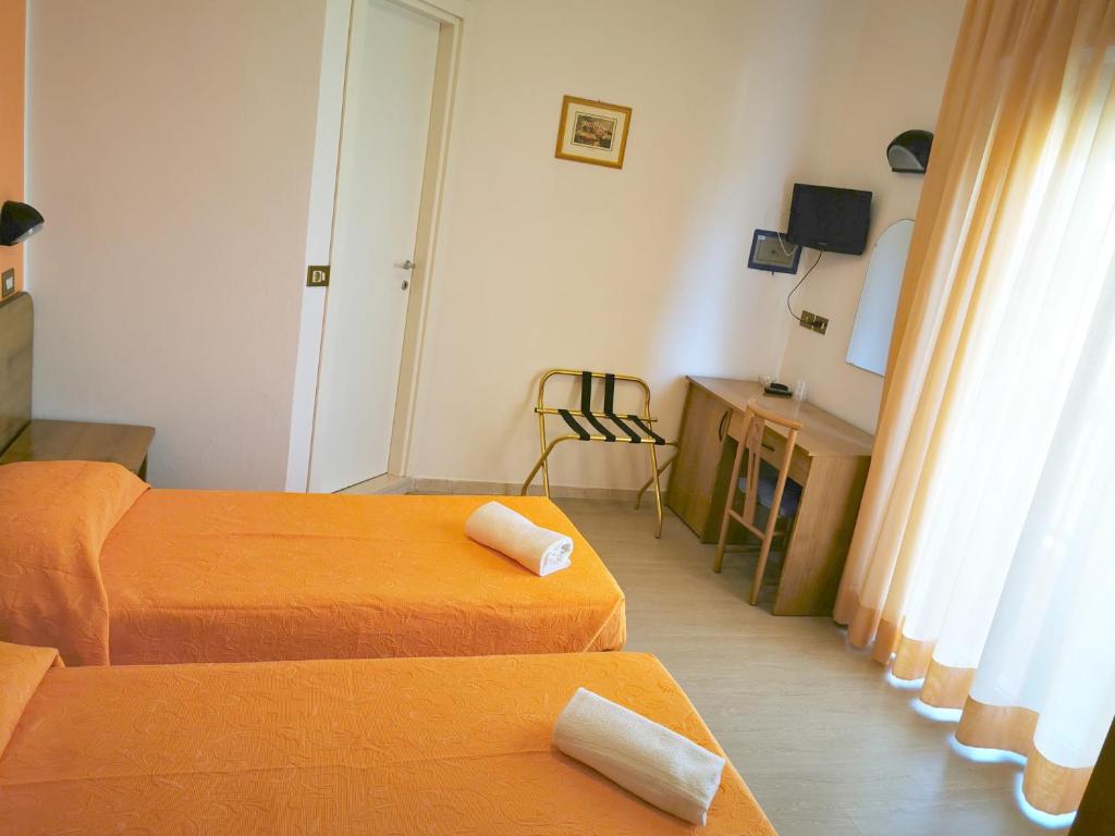 TV a/nebo společenská místnost v ubytování Hotel Tivoli