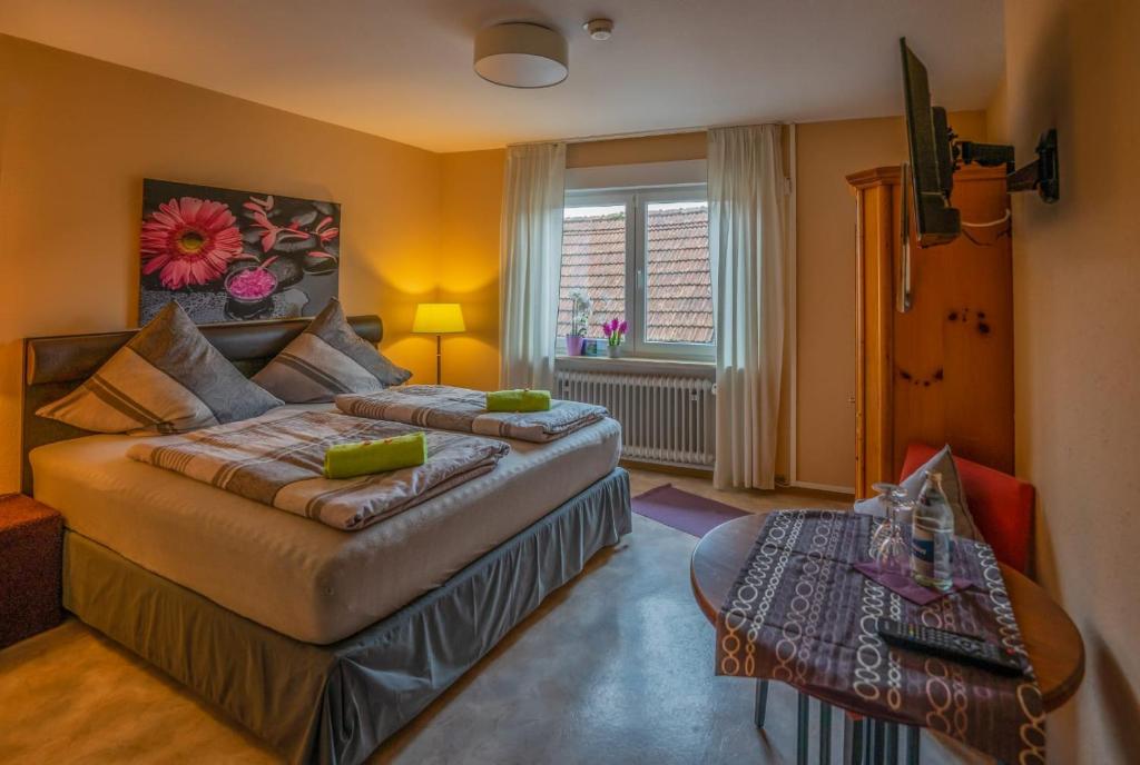 Postel nebo postele na pokoji v ubytování Linde Oberachern