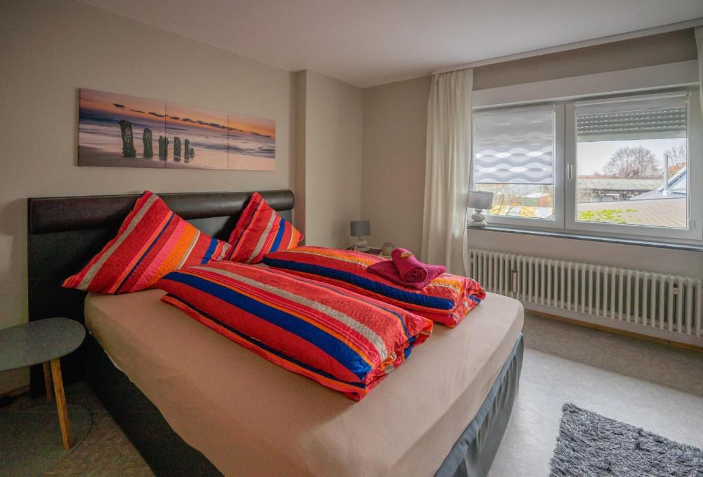 Postel nebo postele na pokoji v ubytování Linde Oberachern